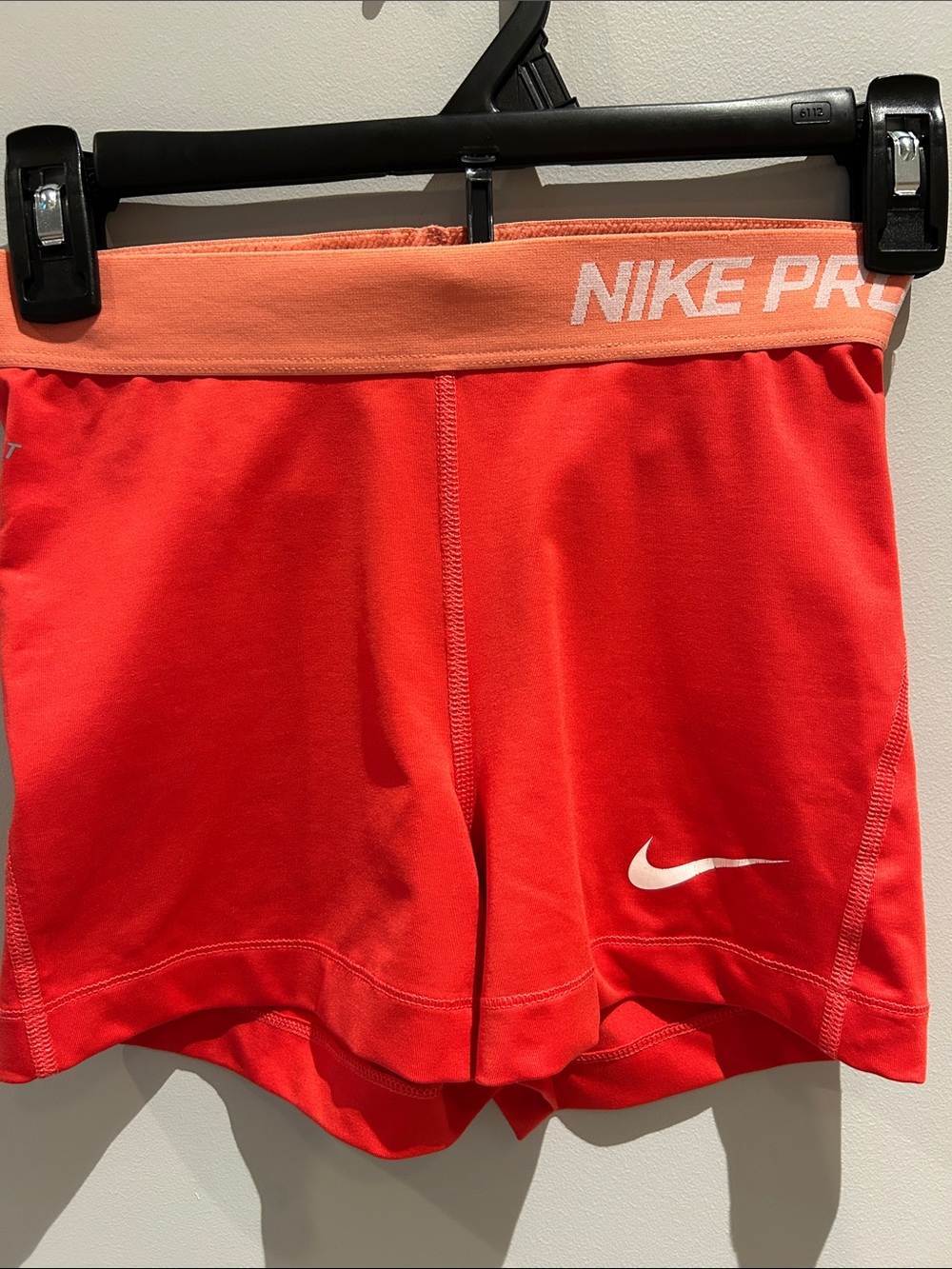 Nike Women's Red Athletic Shorts with Peach Waistband